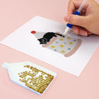 Close-up of drills being placed on a Christmas Black Cats mini diamond painting design