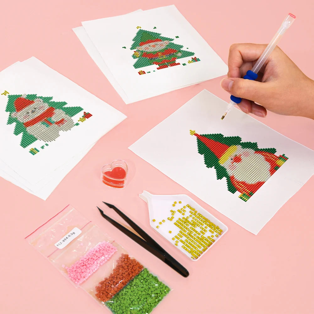 Working on several Christmas Tree Characters mini diamond painting designs with drills and applicator