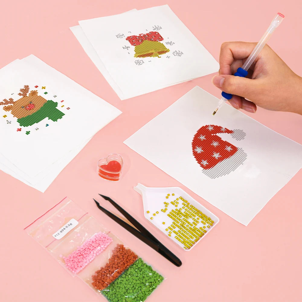 Working on several Classic Christmas Icons mini diamond painting designs with drills and applicator