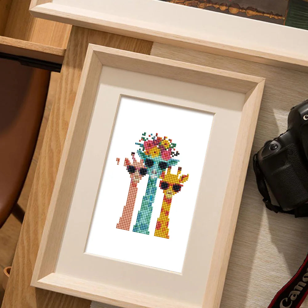 Completed Colourful Animal Friends mini diamond painting shown as framed decor