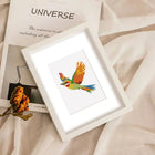 Framed Colourful Birds mini diamond painting artwork displayed in a styled setting