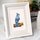Colourful Birds mini diamond painting design displayed in a decorative room setting