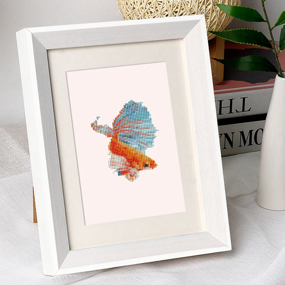 Colourful Tropical Fish mini diamond painting design displayed in a decorative room setting