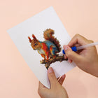 Applying drills to a Colourful Woodland Wildlife mini diamond painting design