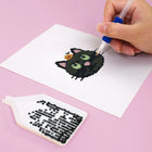 Close-up of drills being placed on a Cute Halloween Icons mini diamond painting design