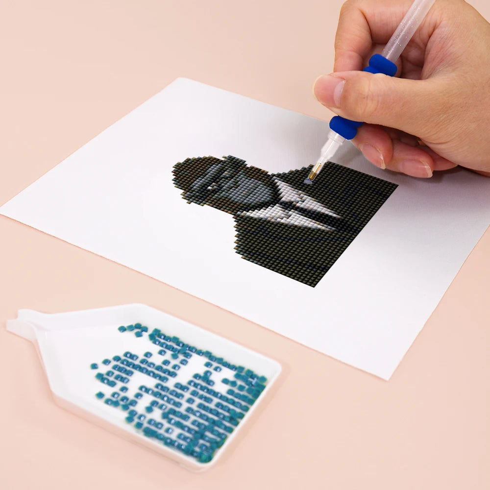 Close-up of drills being placed on a Dapper Animal Gentlemen mini diamond painting design