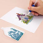 Close-up of drills being placed on a Fairy Garden Cottages mini diamond painting design