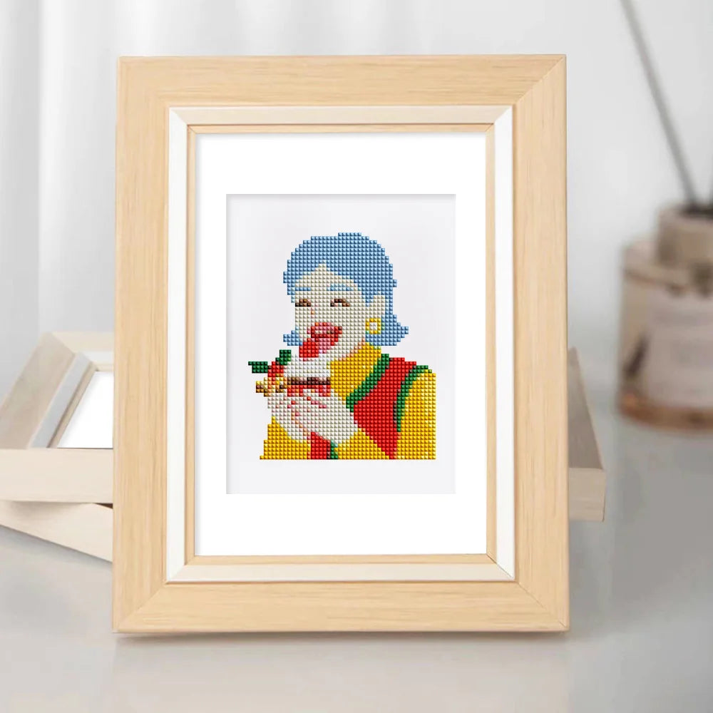 Completed Festive Christmas Characters mini diamond painting shown as framed decor