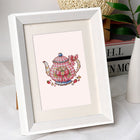 Festive Ornaments & Gifts mini diamond painting design displayed in a decorative room setting