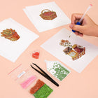Working on several Garden Gifts & Florals mini diamond painting designs with drills and applicator