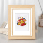 Framed Garden Harvest & Wreaths mini diamond painting artwork displayed in a styled setting