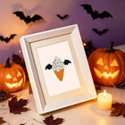 Framed Kawaii Halloween Creatures mini diamond painting artwork displayed in a styled setting
