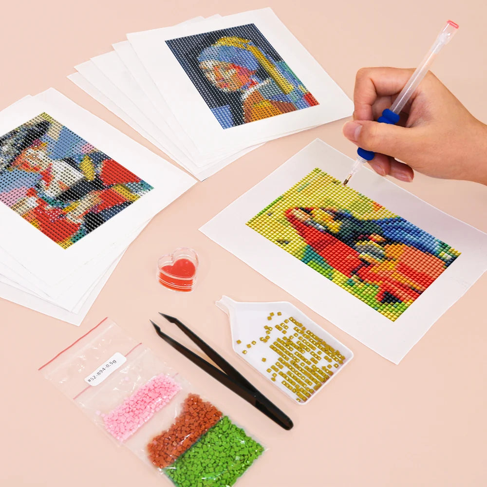 Working on several Pop Art Masterpieces mini diamond painting designs with drills and applicator