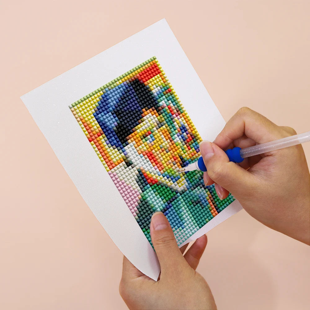 Applying drills to a Pop Art Masterpieces mini diamond painting design