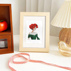 Completed Red Rose Fashion mini diamond painting shown as framed decor