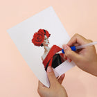 Applying drills to a Red Rose Fashion mini diamond painting design