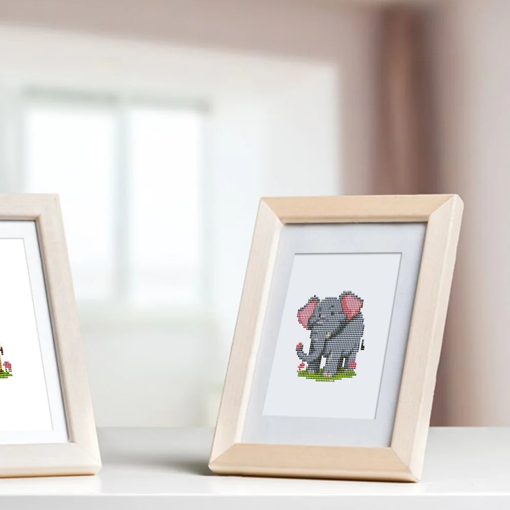 Framed Safari Animal Friends mini diamond painting artwork displayed in a styled setting