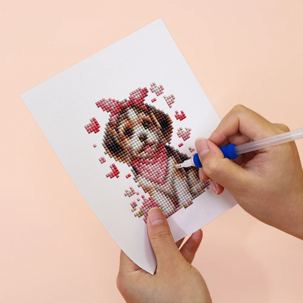 Applying drills to a Valentine Pets mini diamond painting design