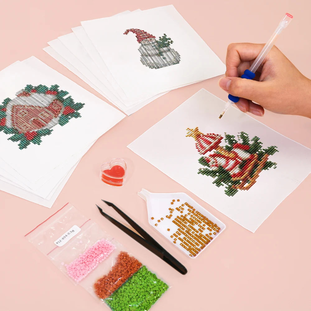 Working on several Vintage Christmas Village mini diamond painting designs with drills and applicator