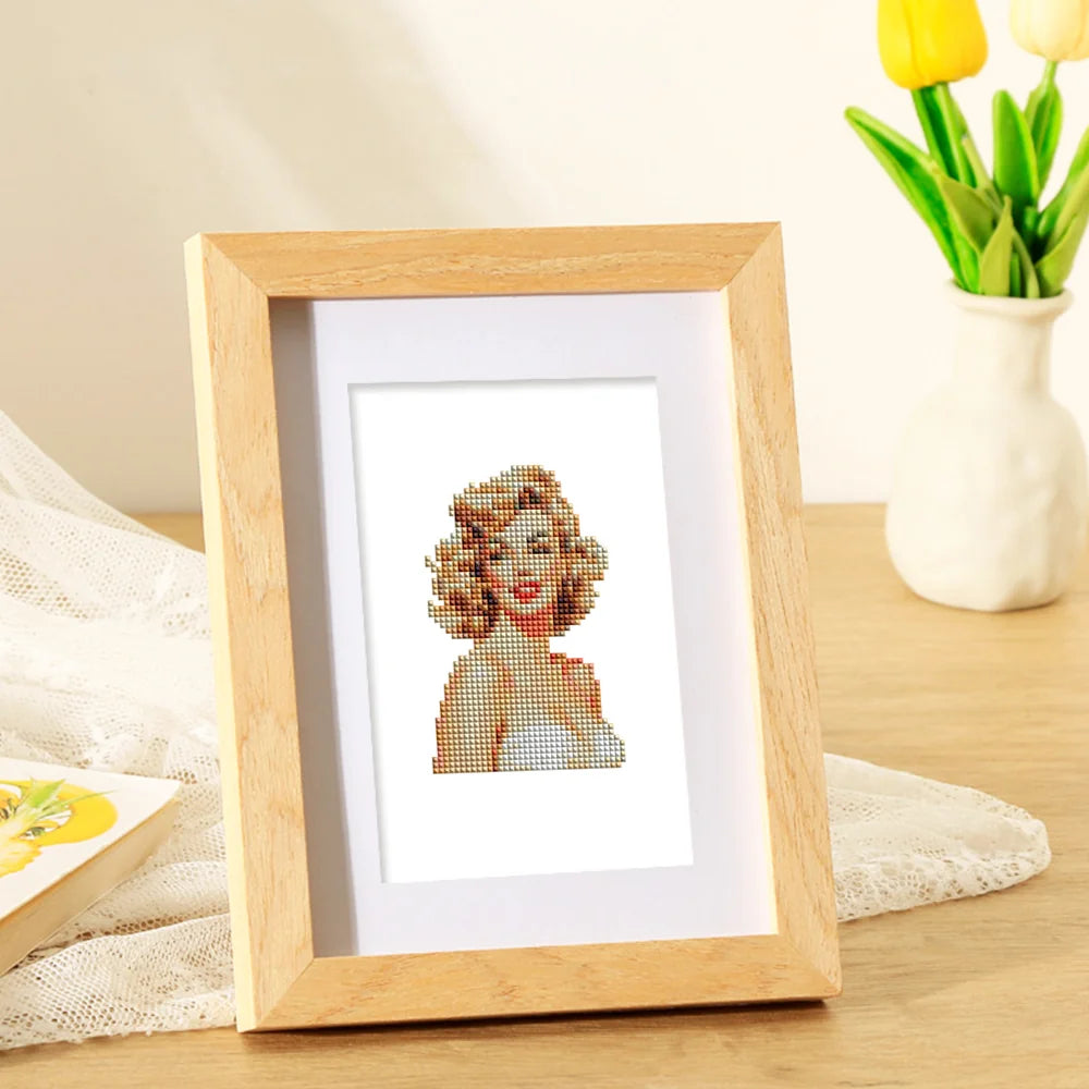 Completed Vintage Glamour Portraits mini diamond painting shown as framed decor