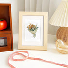 Completed Whimsical Cottage Finds mini diamond painting shown as framed decor